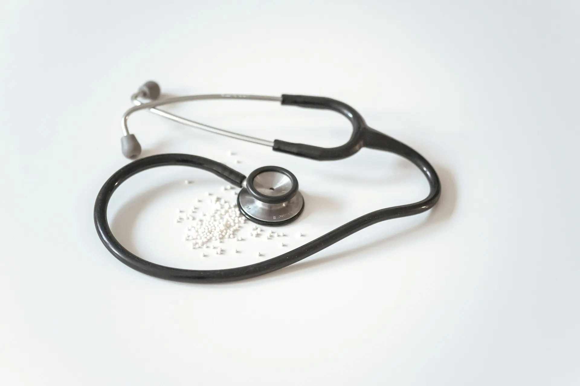Stethoscope on a clean surface representing healthcare