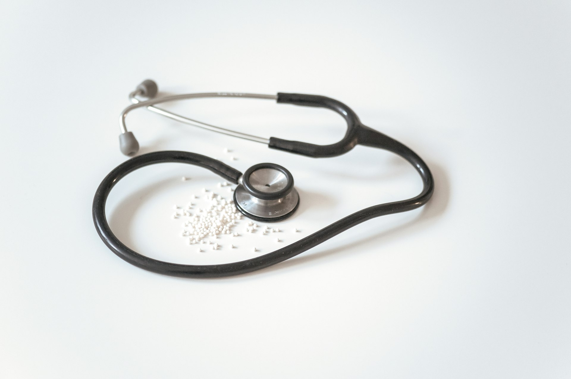 Stethoscope on a clean surface representing healthcare